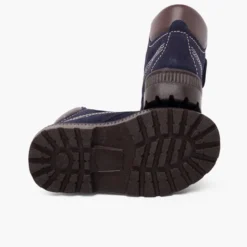 Botas suela track cierre adherente pespuntes