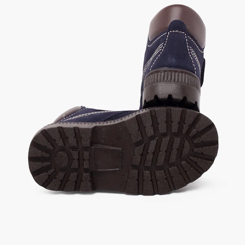 Botas suela track cierre adherente pespuntes
