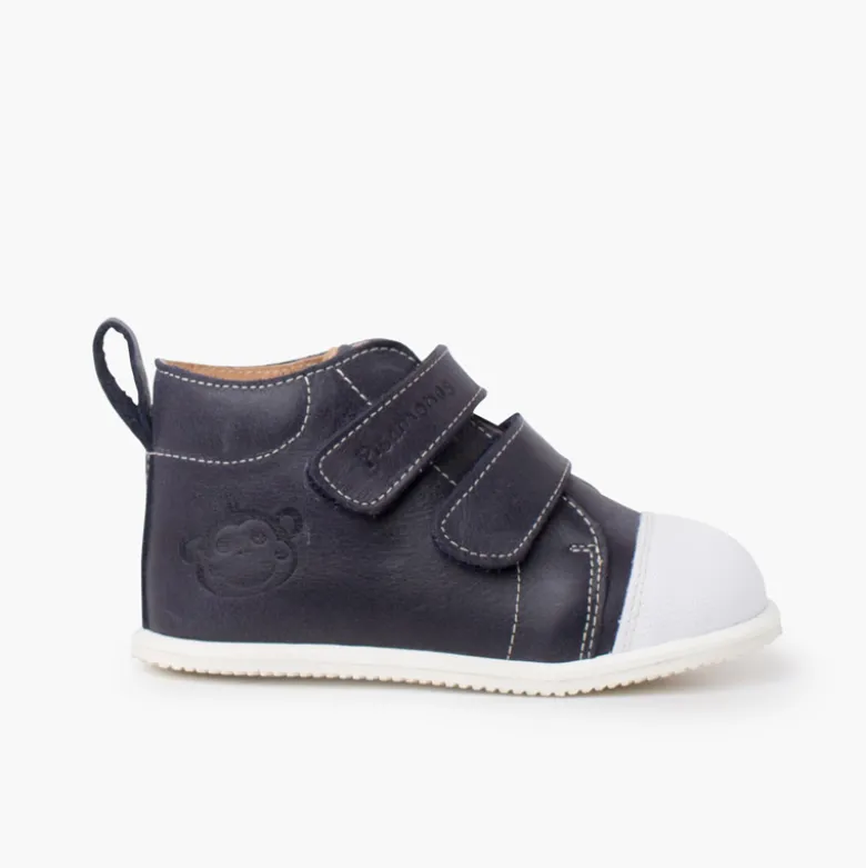 Botita piel sport puntera blanca