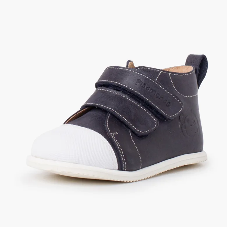 Botita piel sport puntera blanca