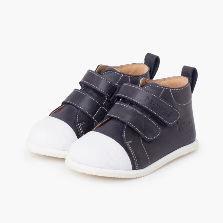 Botita piel sport puntera blanca